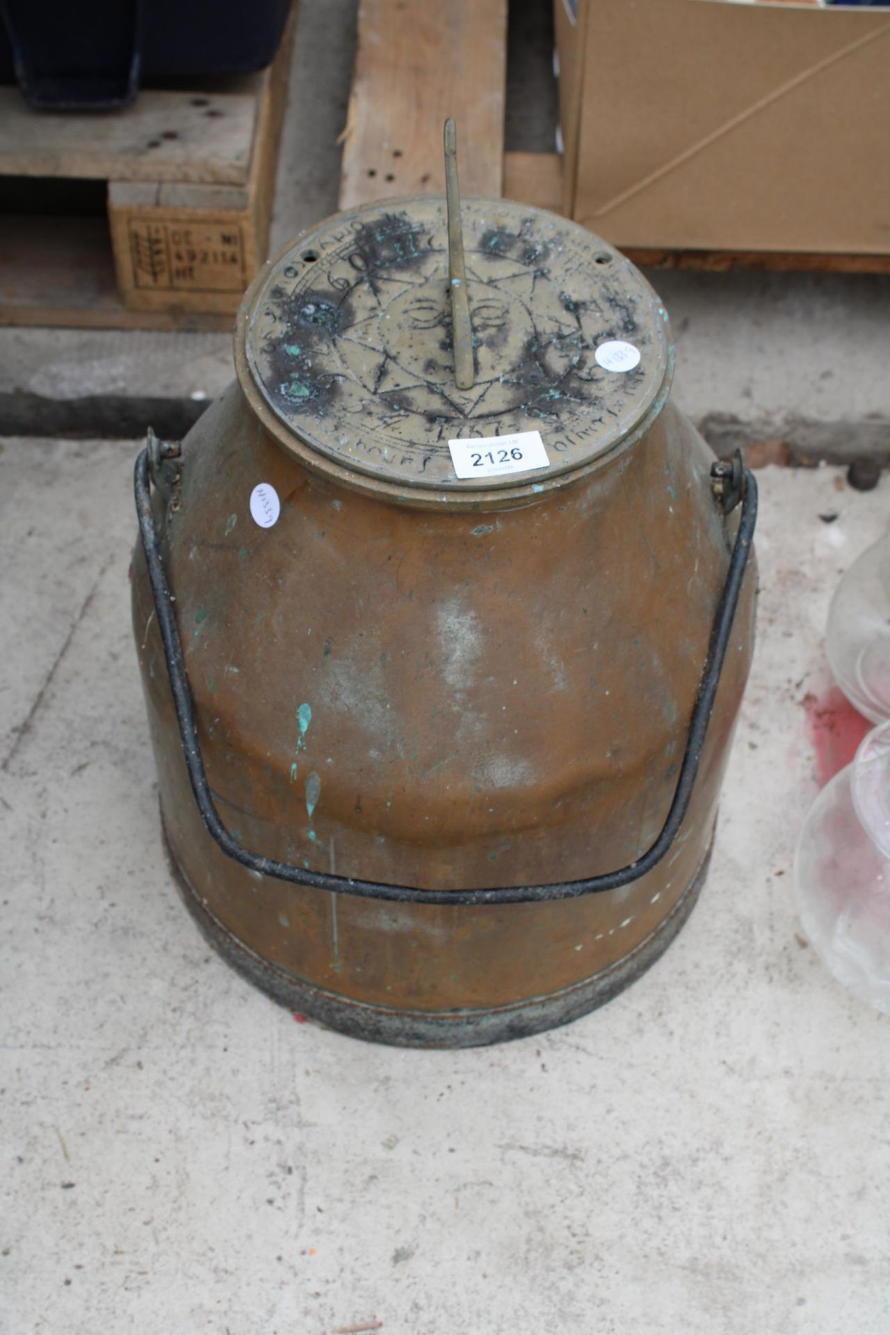 A VINTAGE COPPER MILKING BUCKET WITH BRASS SUNDIAL TOP