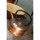 A VINTAGE COPPER KETTLE