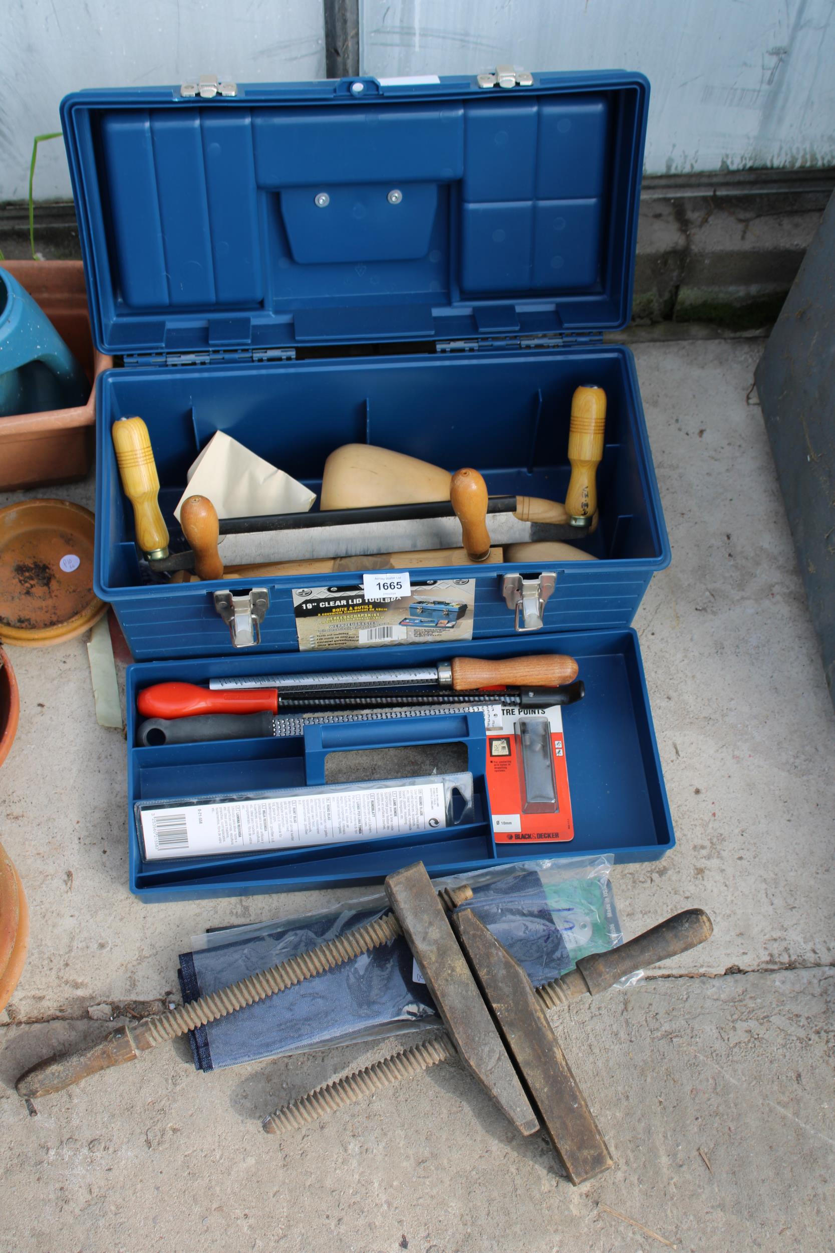 A PLASTIC TOOL BOX WITH AN ASSORTMENT OF TOOLS TO INCLUDE FILES AD A SHAVING PLANE ETC