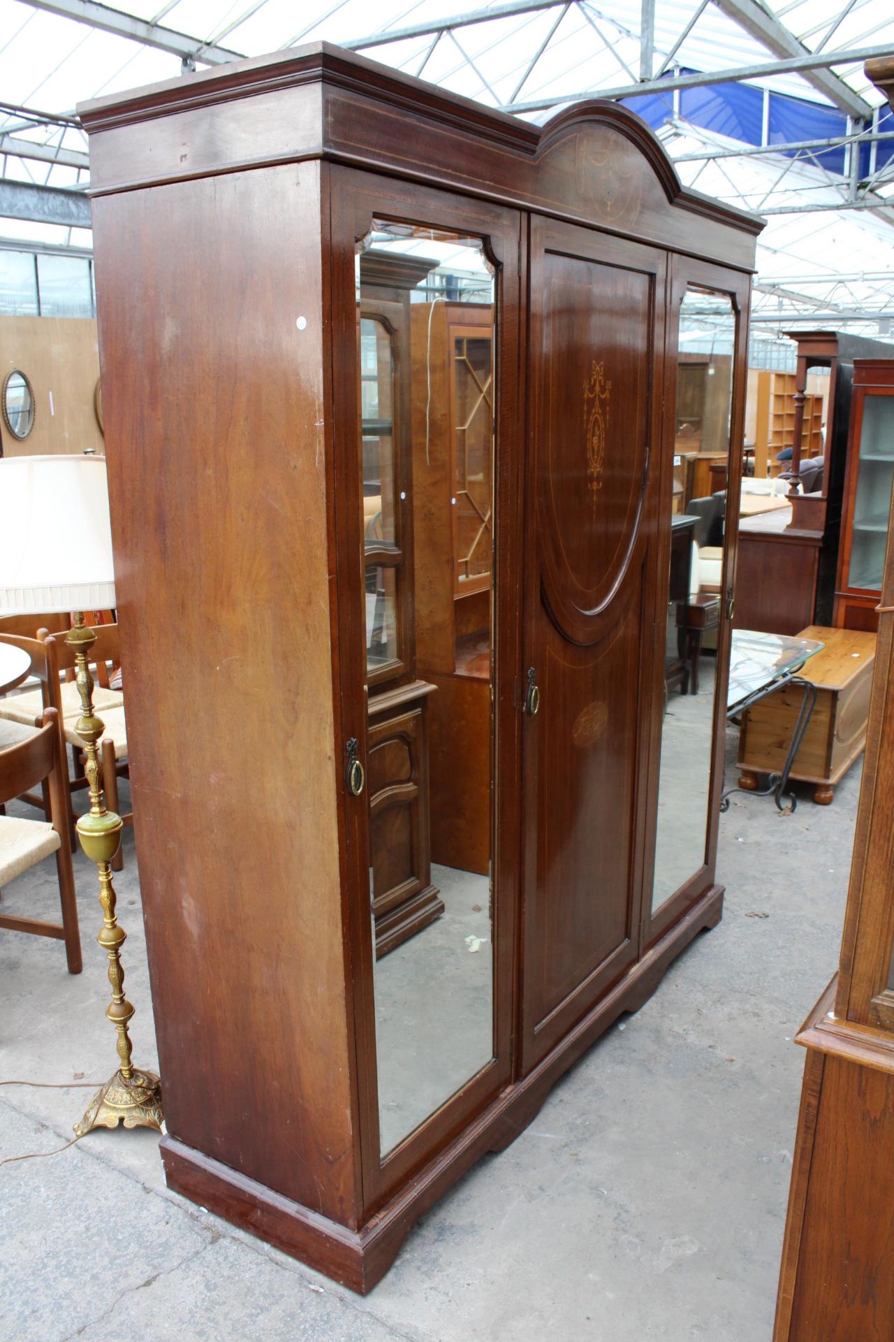 AN EDWARDIAN MAHOGANY AND INLAID DOUBLE MIRROR DOOR WARDROBE 74" WIDE