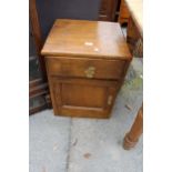 AN OAK BEDSIDE POT CUPBOARD