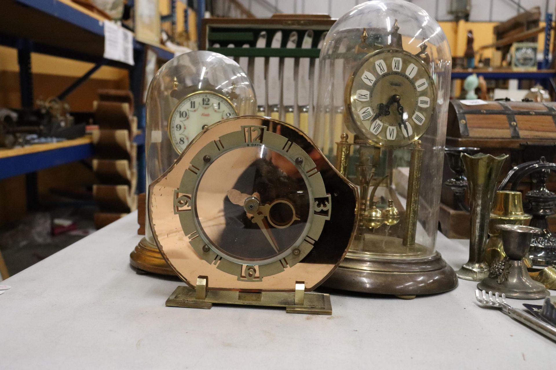 TWO VINTAGE ANNIVERSARY CLOCKS IN DOMES PLUS A MANTLE CLOCK