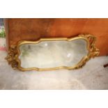 A 19TH CENTURY GILT EFFECT BEVEL EDGE WALL MIRROR, 37" X 21"