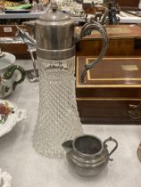 A CUT GLASS CLARET JUG WITH SILVER PLATED TOP AND A SMALL PEWTER JUG