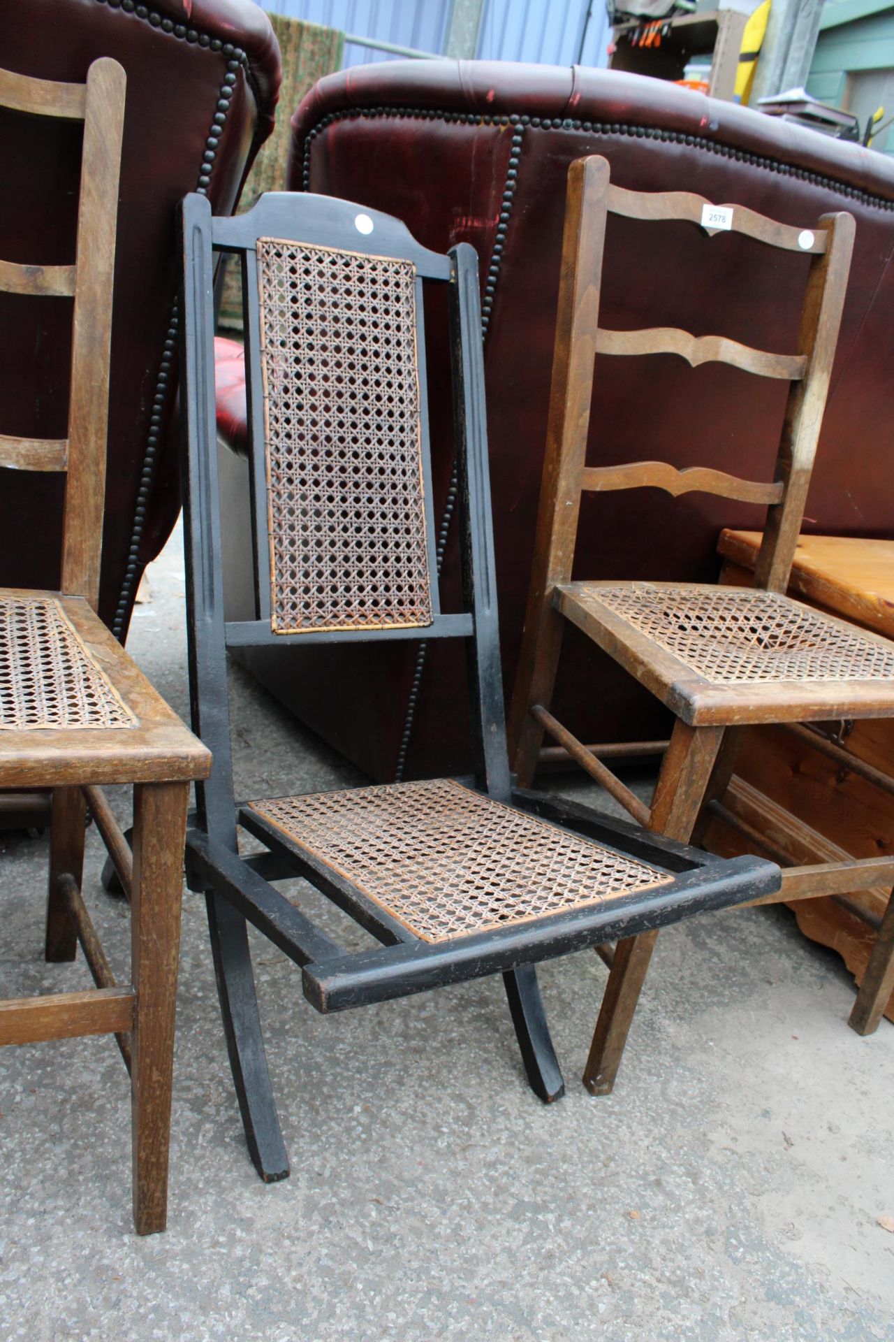 A PAIR OF EDWARDIAN BEDROOM CHAIRS AND EBONISED CAMPAIGN STYLE FOLDING CHAIR WITH CANE BACK AND SEAT - Image 2 of 2