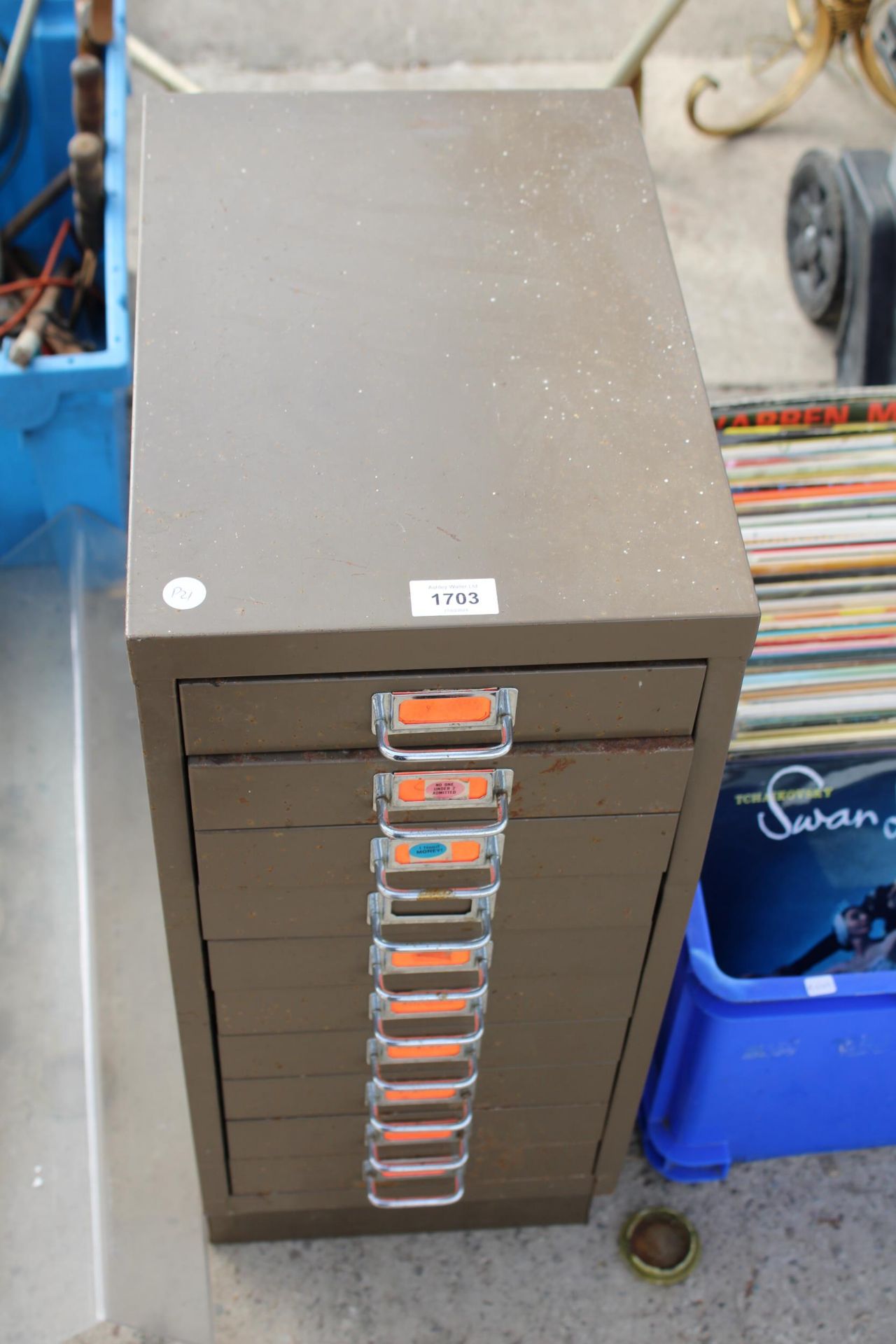 A MINIATURE TEN DRAWER METAL FILING CABINET