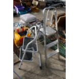 A TWO RUNG ALUMINIUM STEP LADDER AND A TWO RUNG NON SLIP LADDER