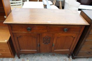 AN OAK ART NOUVEAU INFLUENCE SIDEBOARD, 48" WIDE