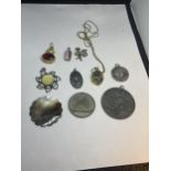 TEN VARIOUS VINTAGE PENDANTS ONE ON A CHAIN