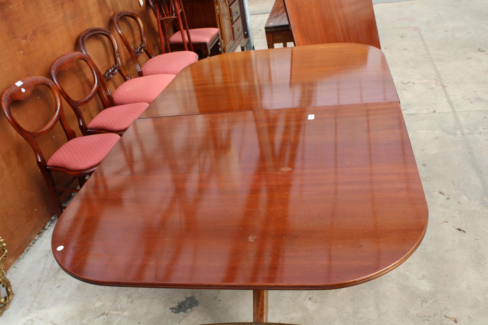 A MAHOGANY REGENCY STYLE TWIN PEDESTAL EXTENDING DINING TABLE, 72" X 42" (LEAF 27") ON BRASS CLAW - Image 2 of 3