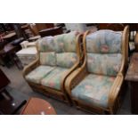 A WICKER AND BAMBOO TWO SEATER SETTEE AND EASY CHAIR