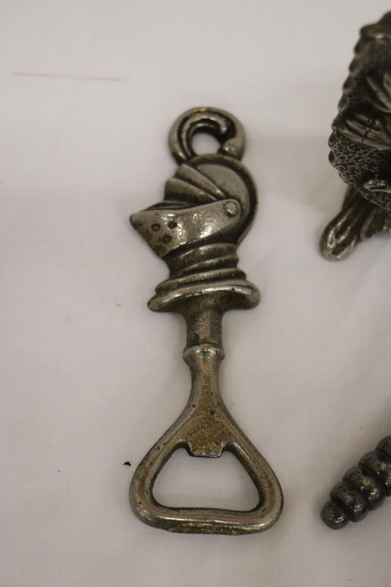 A GRYPHON DOOR STOP TOGETHER WITH A KNIGHT BOTTLE OPENER AND VICTORIAN NUT CRACKER - Image 2 of 7