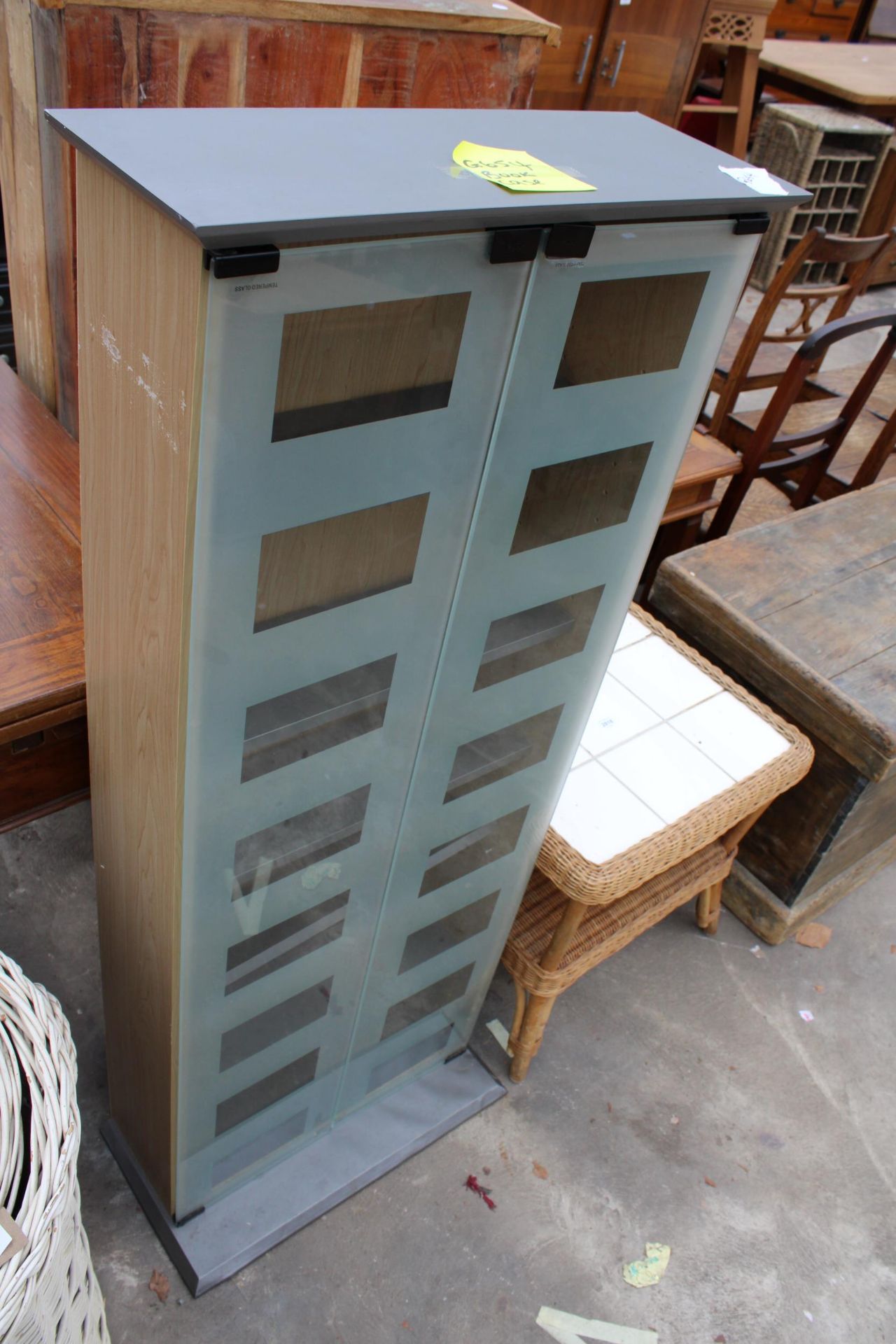 A TWO TIER WICKER LAMP TABLE WITH TILED TOP AND A GLASS FRONTED TWO DOOR BOOKCASE - Image 3 of 3