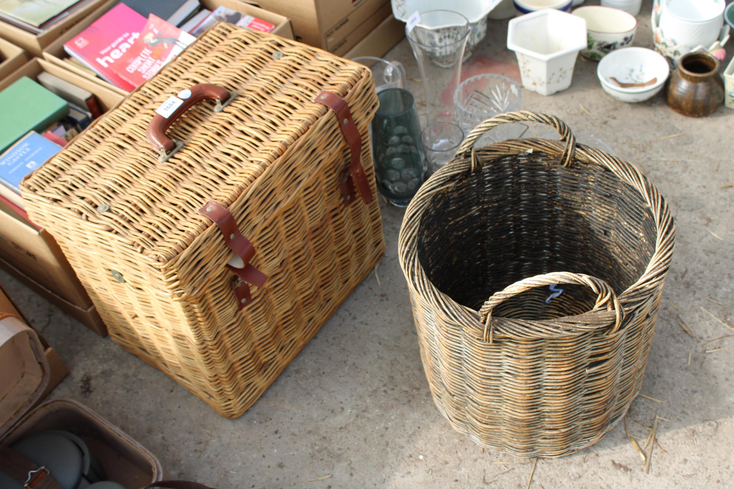 A VINTAGE WICKER LOG BASKET AND A PART COMPLETE WICKER BREXTON HAMPER