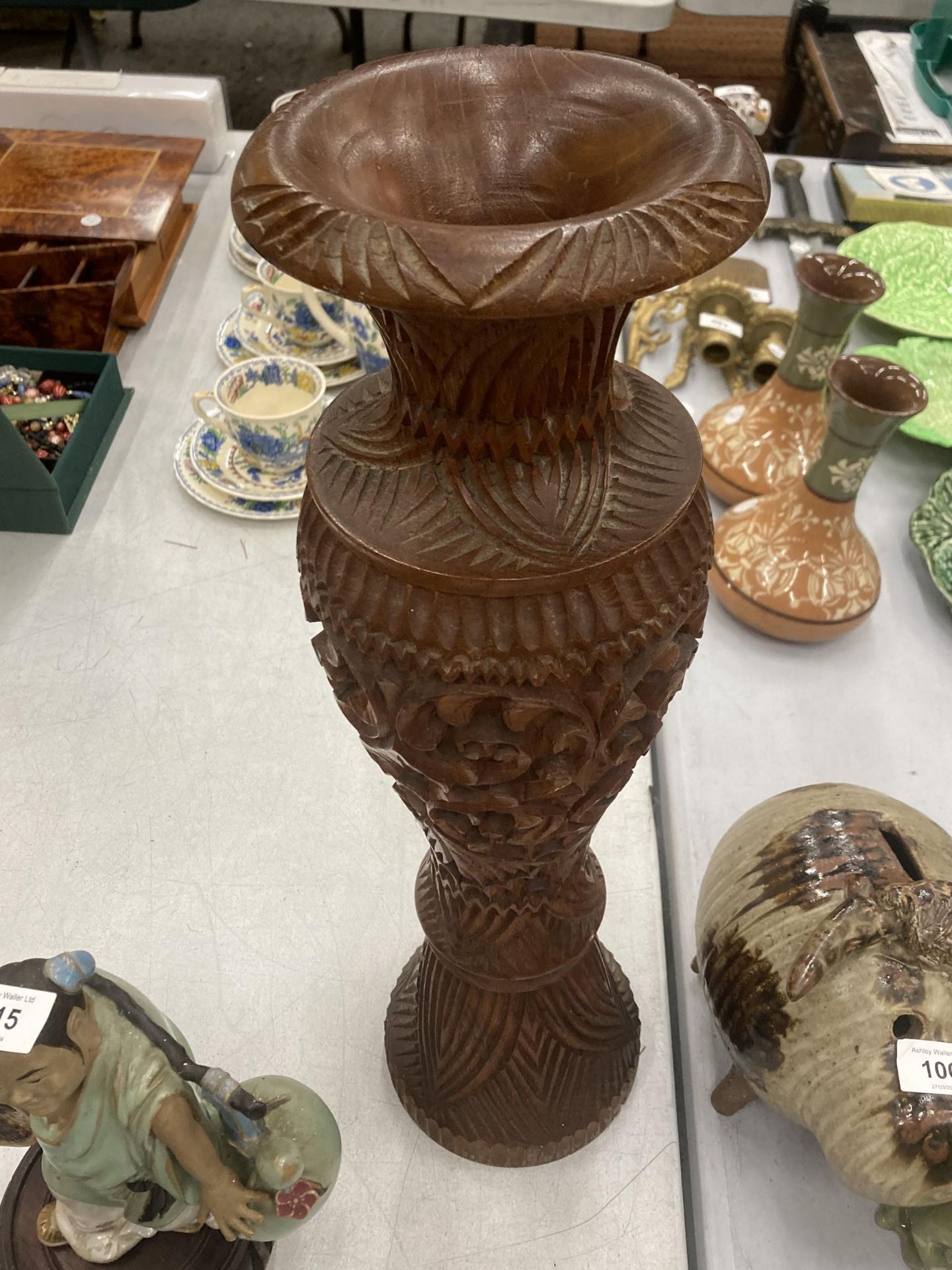 A LARGE HEAVILY CARVED WOODEN VASE, HEIGHT 50CM - Image 2 of 2
