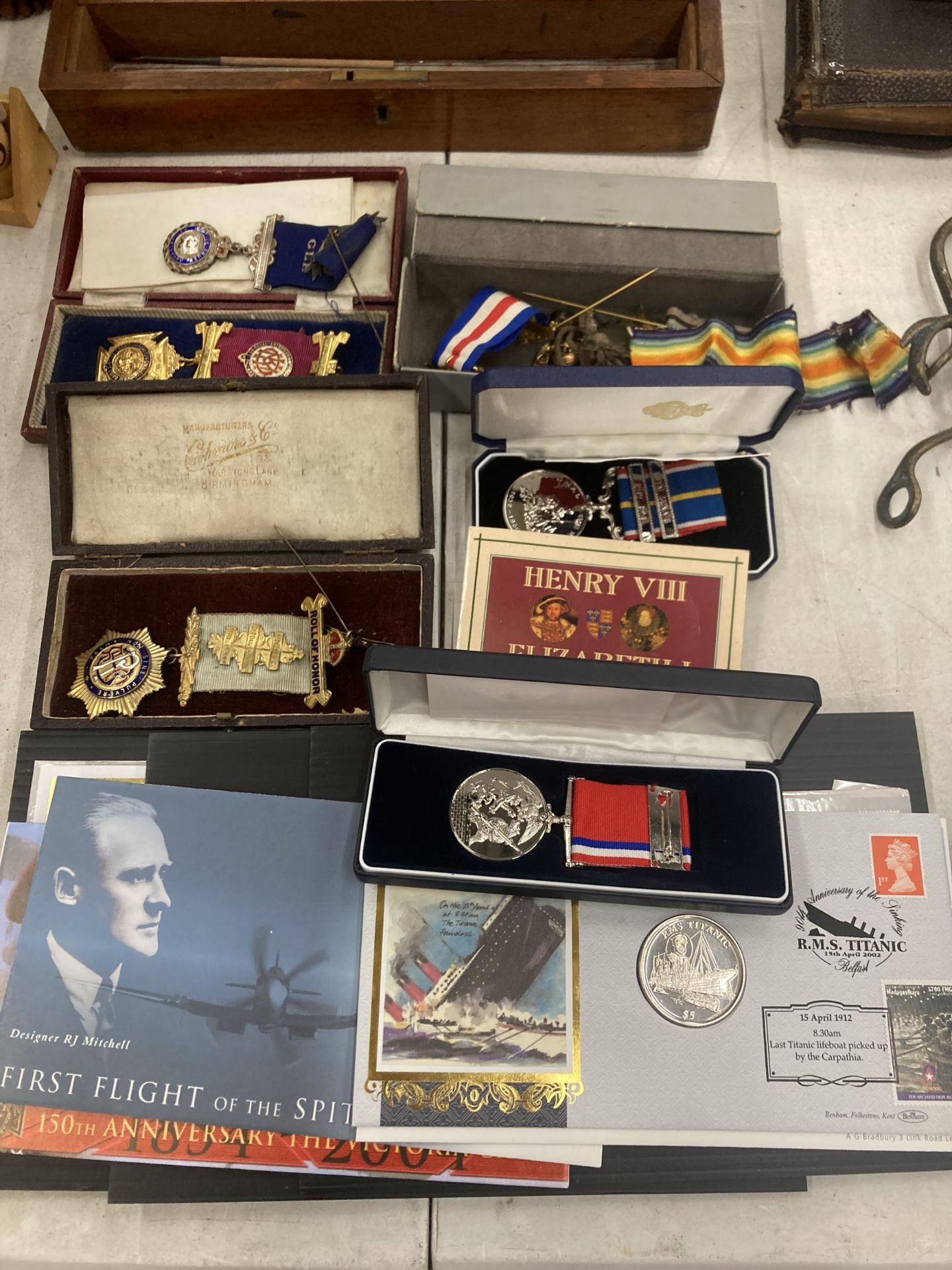 A QUANTITY OF FIRST DAY COVERS, COINS AND MEDALS