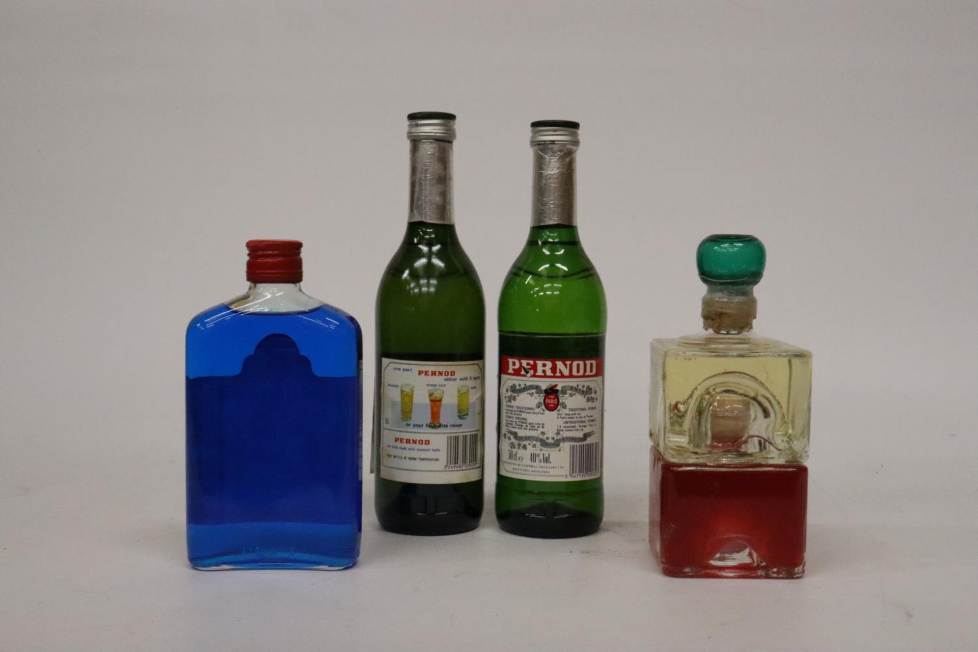 TWO 50CL BOTTLES OF PERNOD FILS, A 37.5CL BOTTLE OF BLUE CURACAO AND A BOTTLE OF - Image 3 of 4