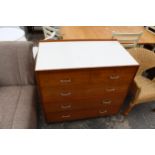 A 20TH CENTURY EX WD MAHOGANY CHEST OF TWO SHORT AND THREE DRAWERS WITH FORMICA TOP STAMPED PAPWORTH