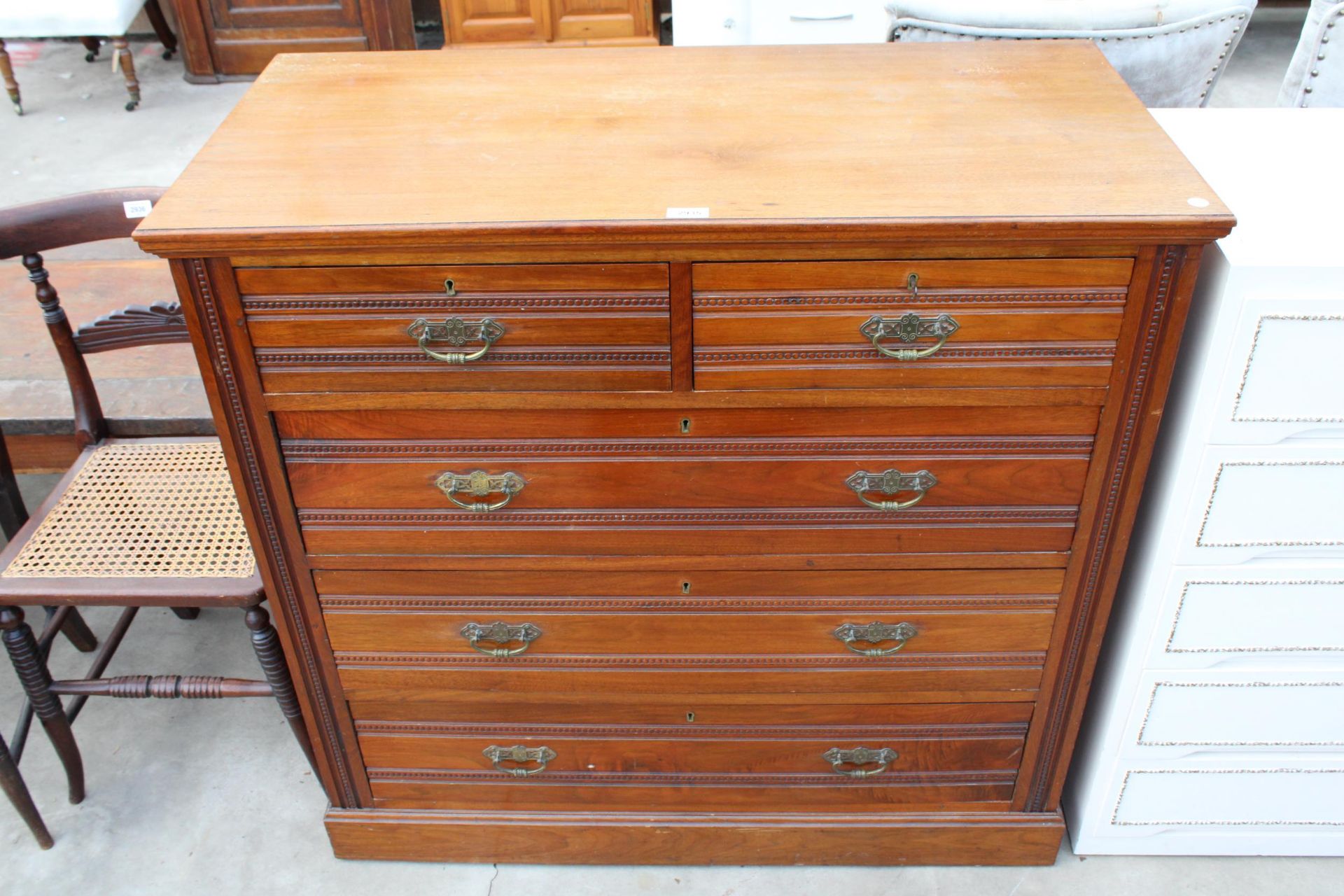 A LATE VICTORIAN MAHOGANY CHEST OF TWO SHORT AND THREE LONG DRAWERS WITH BRASS HANDLES 40" WIDE