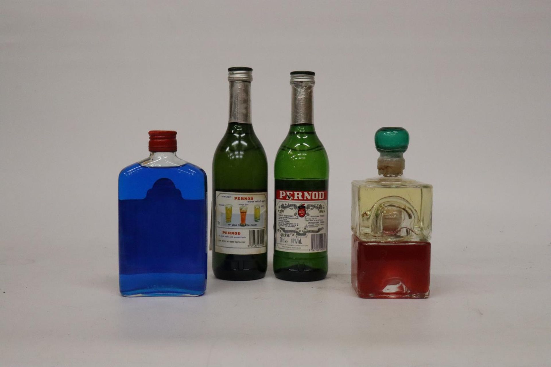 TWO 50CL BOTTLES OF PERNOD FILS, A 37.5CL BOTTLE OF BLUE CURACAO AND A BOTTLE OF - Image 4 of 4