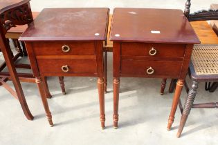 A PAIR OF TWO DRAWER BEDSIDE TABLES