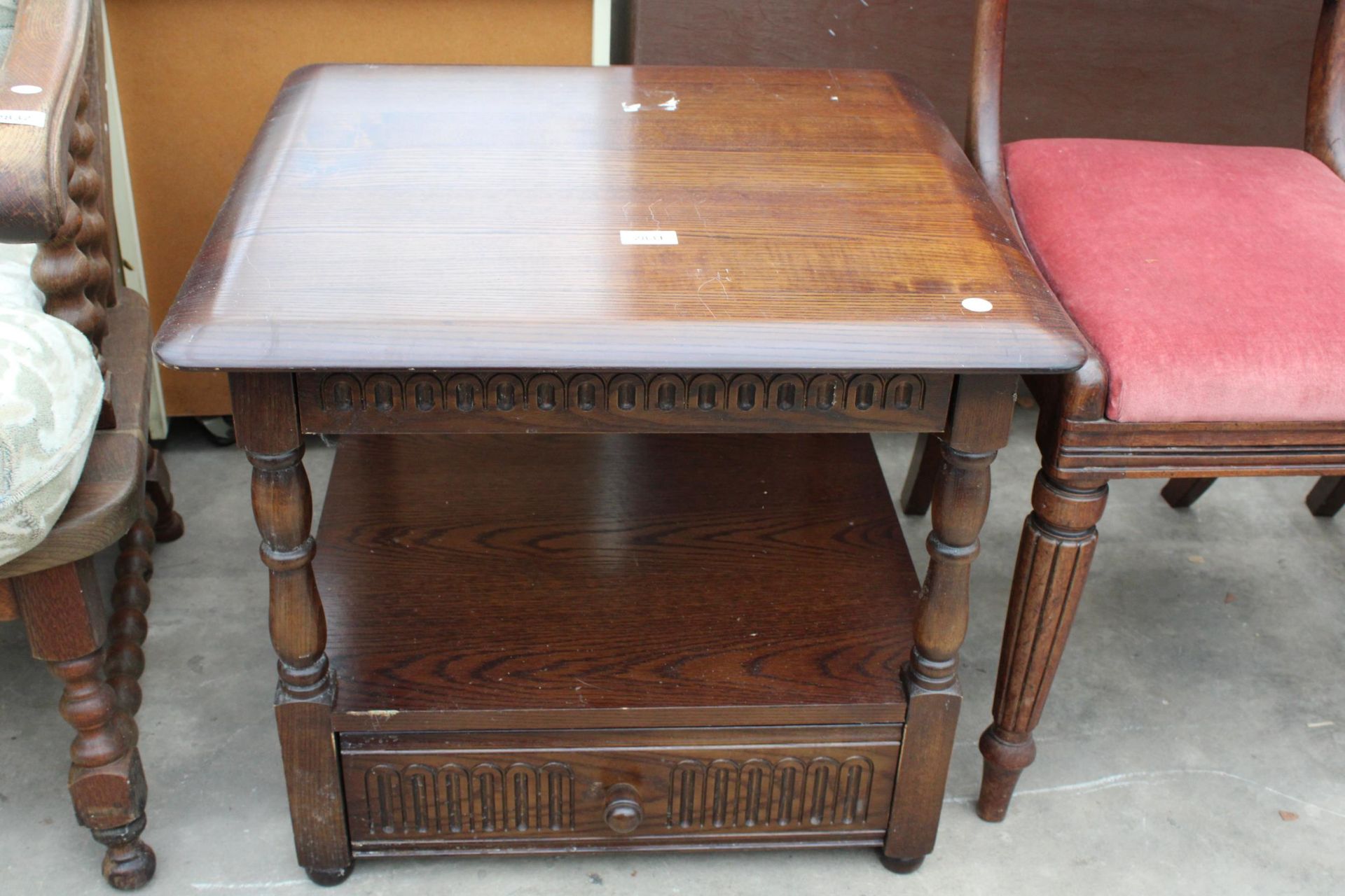 AN OAK JAYCEE STYLE TWO TIER LAMP TABLE WITH DRAWER