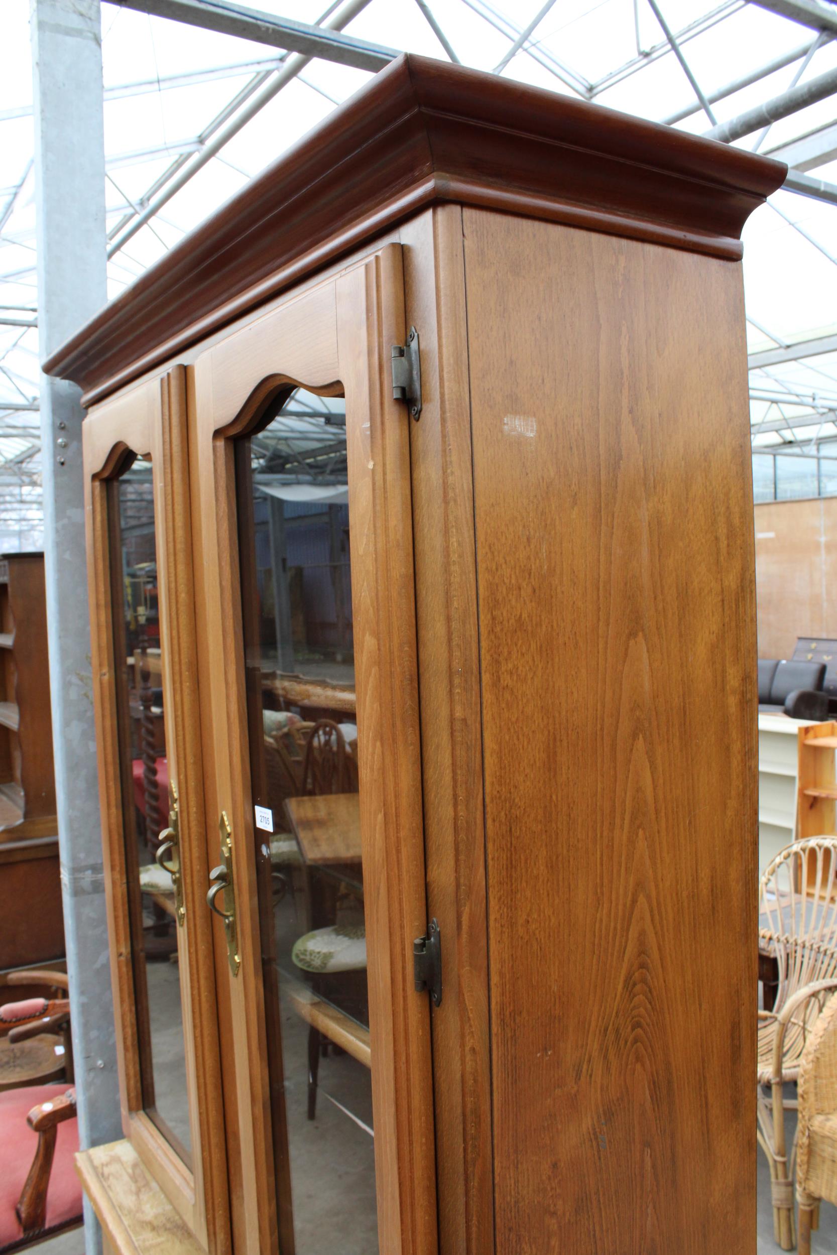 A BEECH TWO DOOR BOOKCASE ON BASE 41" WIDE - Image 2 of 3