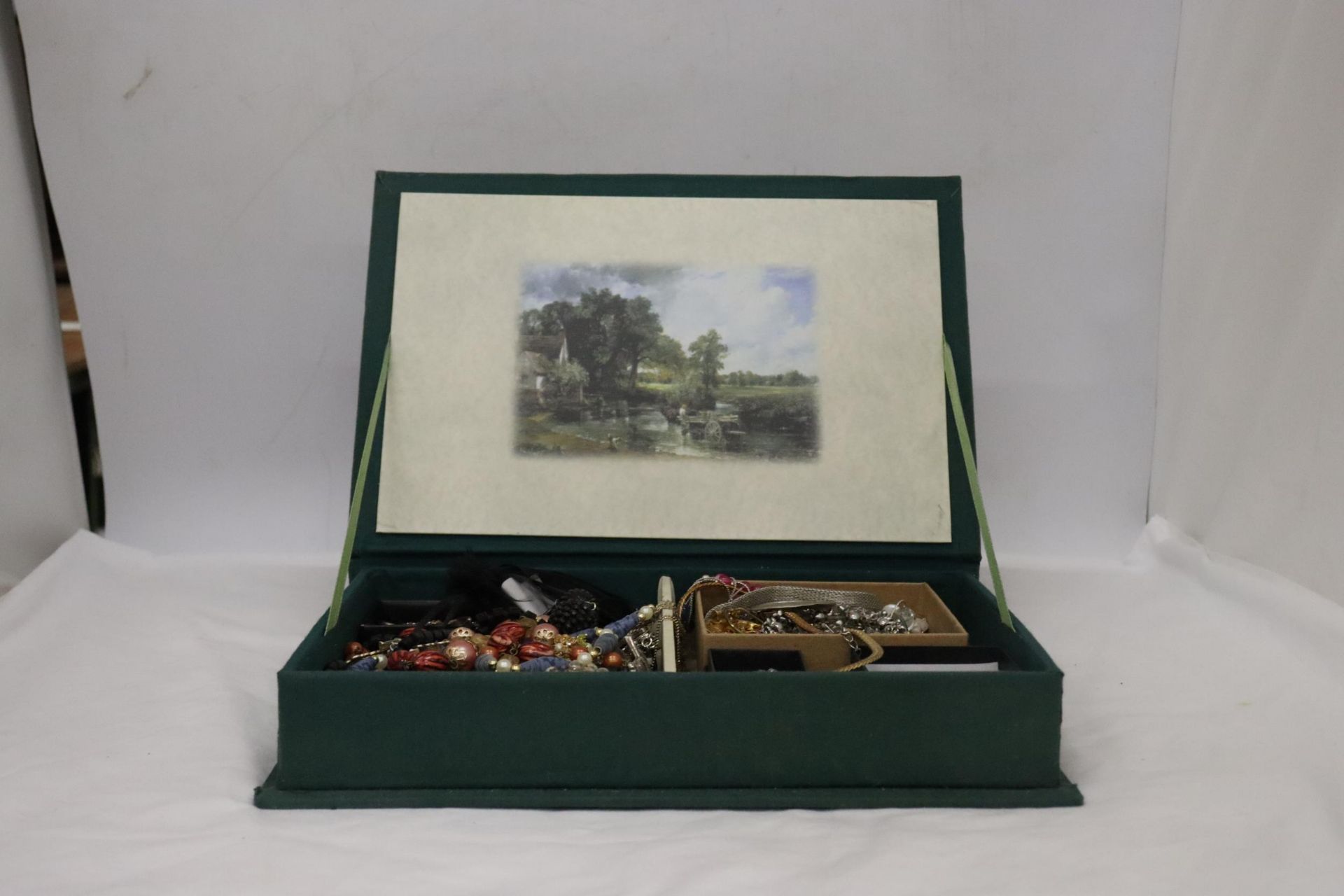 A BOX CONTAINING A QUANTITY OF COSTUME JEWELLERY