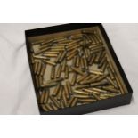 A QUANTITY OF OVER 100 BRASS BULLET CASINGS