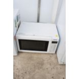 A WHITE PANASONIC MICROWAVE OVEN