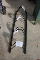 A FOUR SECTION METAL BIKE RACK