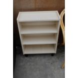 A PAINTED OPEN BOOKCASE 24" WIDE