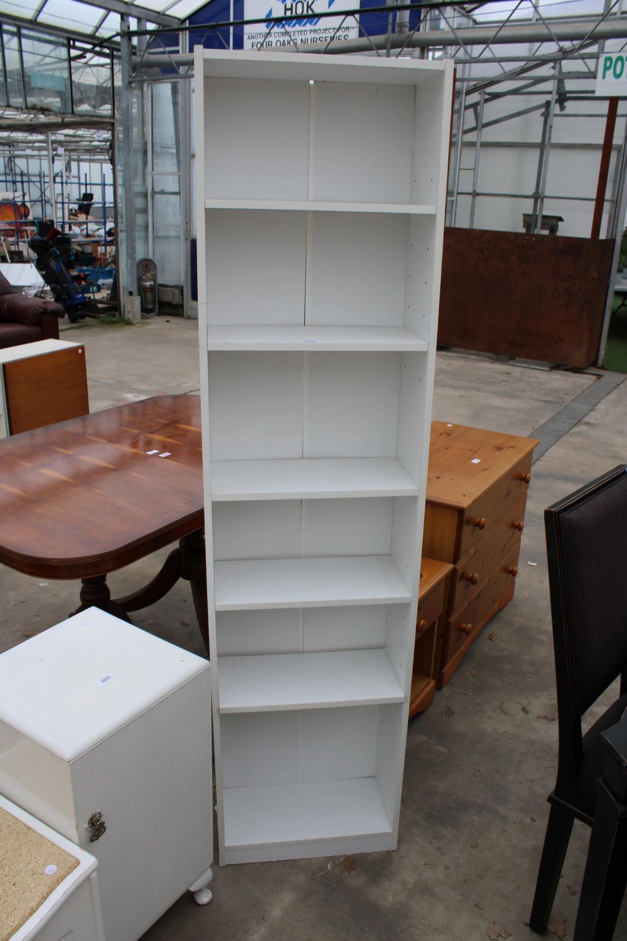 A TALL SIX TIER WHITE OPEN BOOKCASE 18" WIDE