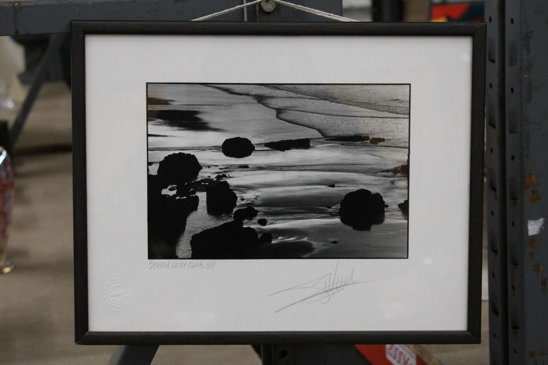 A FRAMED PHOTOGRAPHIC IMAGE OF THE SEA, SIGNED