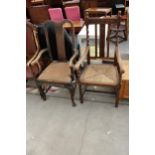 TWO EARLY 20TH CENTURY OAK CARVER CHAIRS