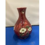 A MINTON SECESSIONIST VASE IN RED WITH CREAM FLOWERS CIRCA 1910 MARKED TO THE BASE MINTONS LTD No 33