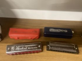 TWO HARMONICAS TO INCLUDE A HOHNER SILVER STAR IN KEY D PLUS A HOHNER STUDENT HARMONICA