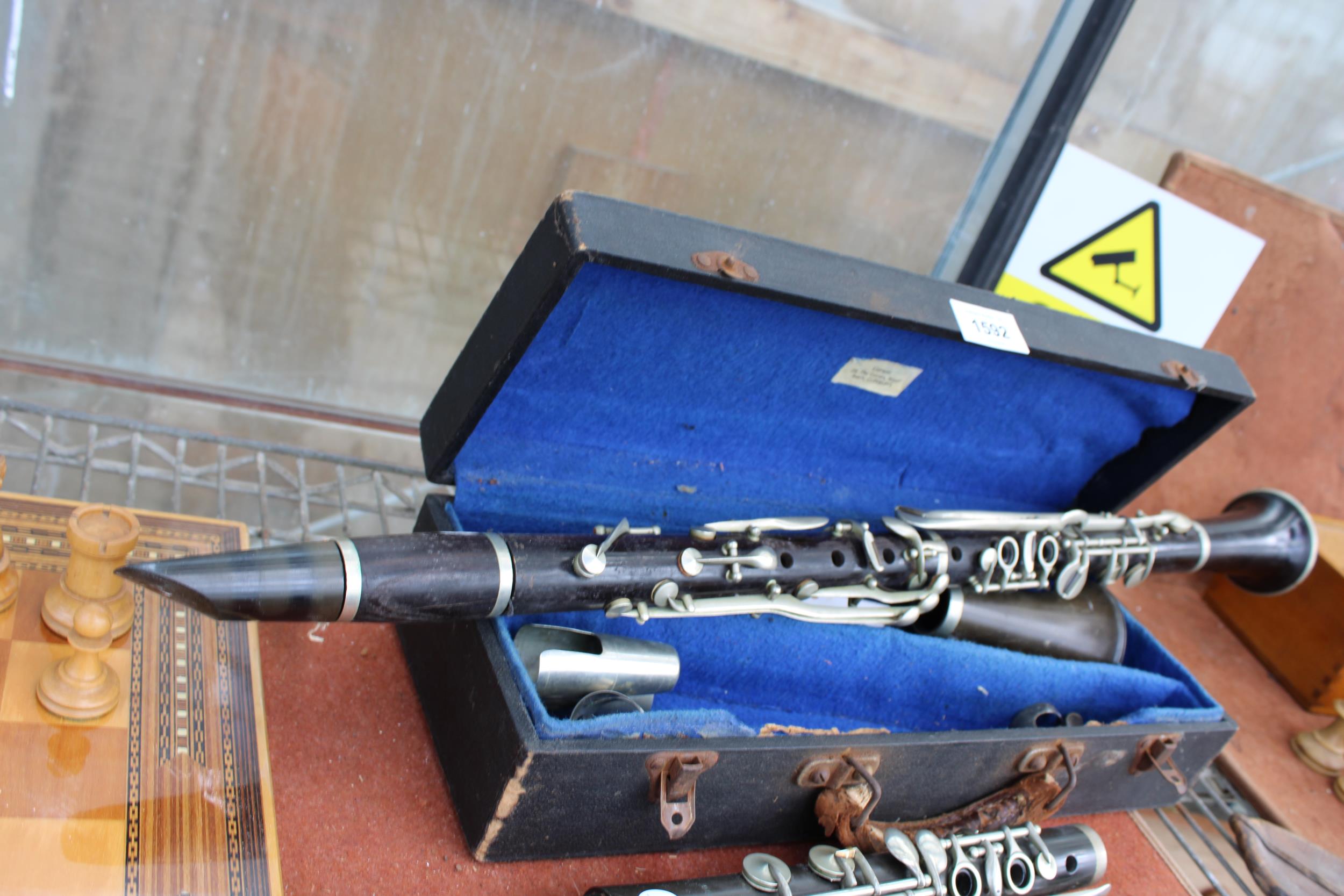 A BELIEVED COMPLETE VINTAGE JACQUES ALBERT CLARINET WITH CARRY CASE AND AN ASSORTMENT OF BOOZY - Image 3 of 3