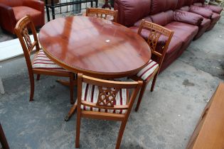 A YEW EXTENDING DINING TABLE 43" DIAMETER AND FOUR CHAIRS