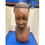 A CARVED TRIBAL BUST HEIGHT APPROX 44CM
