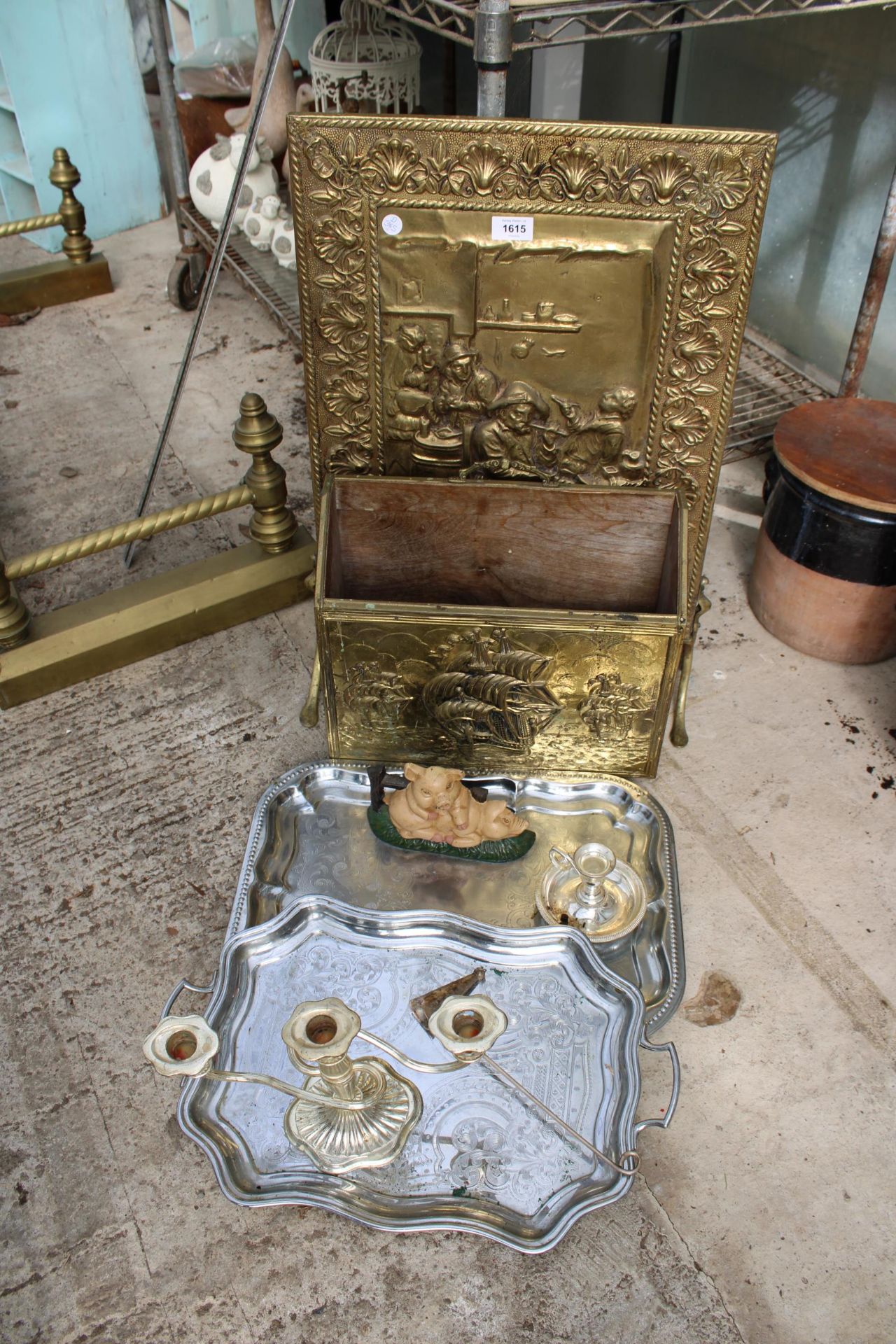 AN ASSORTMENT OF ITEMS TO INCLUDE A BRASS FIRE SCREEN, SILVER PLATED CANDLE STICKS AND A CAST PIG