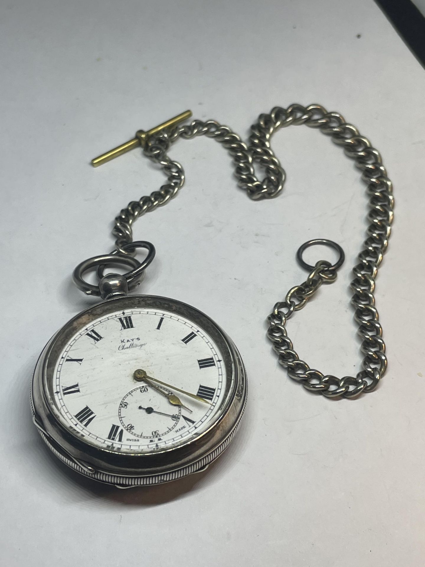 A MARKED 925 SILVER SWISS KAYS CHALLENGE POCKET WATCH WITH T BAR CHAIN VENDOR STATES WORKING BUT