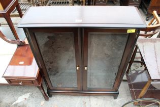 A STAG MINSTREL TWO DOOR GLAZED BOOKCASE 32" WIDE