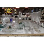 A LARGE QUANTITY OF GLASSWARE TO INCLUDE CHAMPAGNE FLUTES, WINE GLASSES, SHERRY, PORT, A MURANO