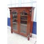 A VICTORIAN MAHOGANY TWO DOOR GLAZED BOOKCASE 59" WIDE
