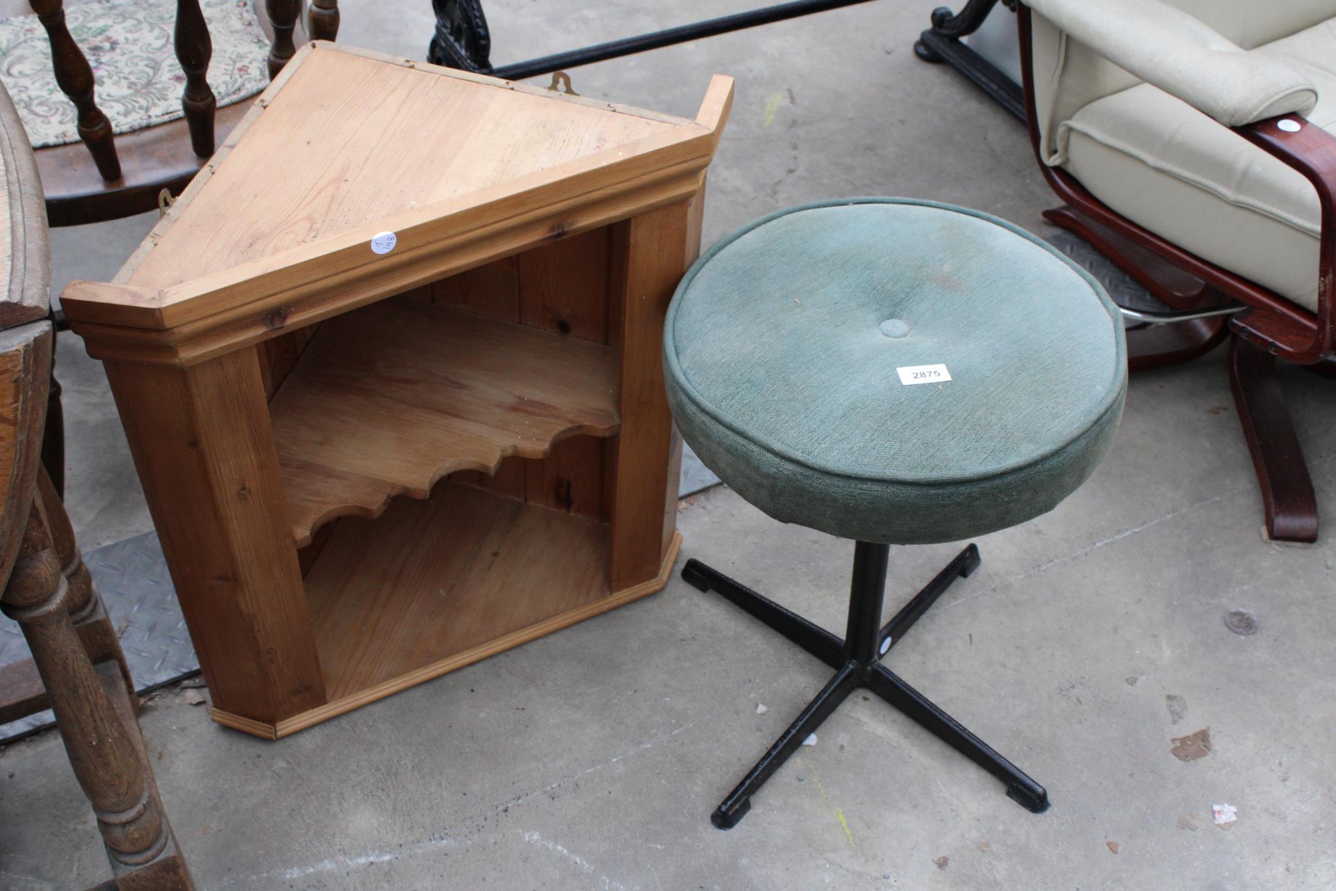 AN UPHOLSTERED STOOL ON METAL BASE AND A SMALL OPEN PINE CORNER CUPBOARD