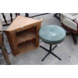 AN UPHOLSTERED STOOL ON METAL BASE AND A SMALL OPEN PINE CORNER CUPBOARD