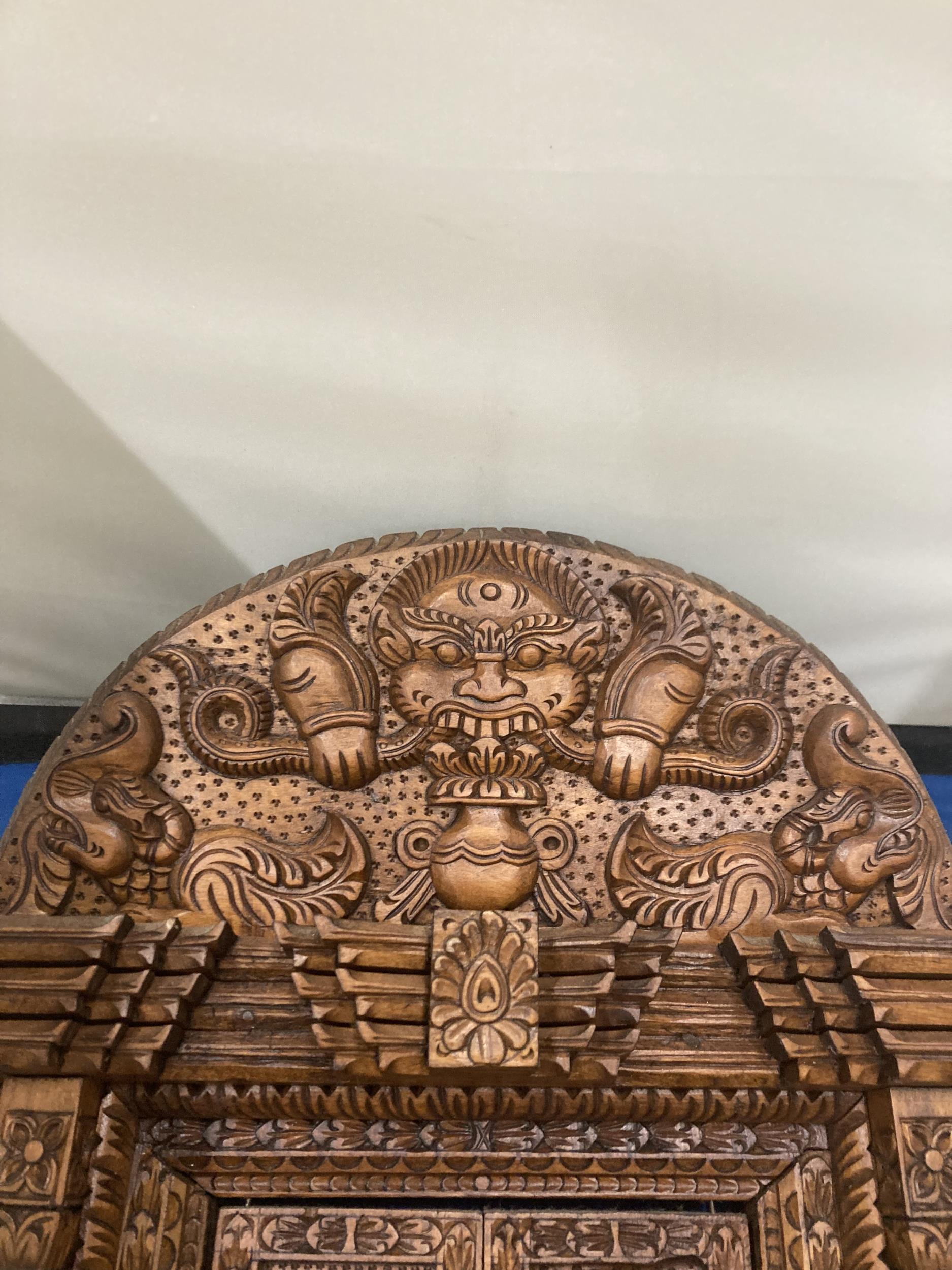 A HEAVILY CARVED ASTAMANGAL DOOR FRAME WALL HANGING - Image 2 of 5
