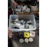 A LARGE ASSORTMENT OF CERAMIC CUPS AND BISCUIT BARRELS ETC