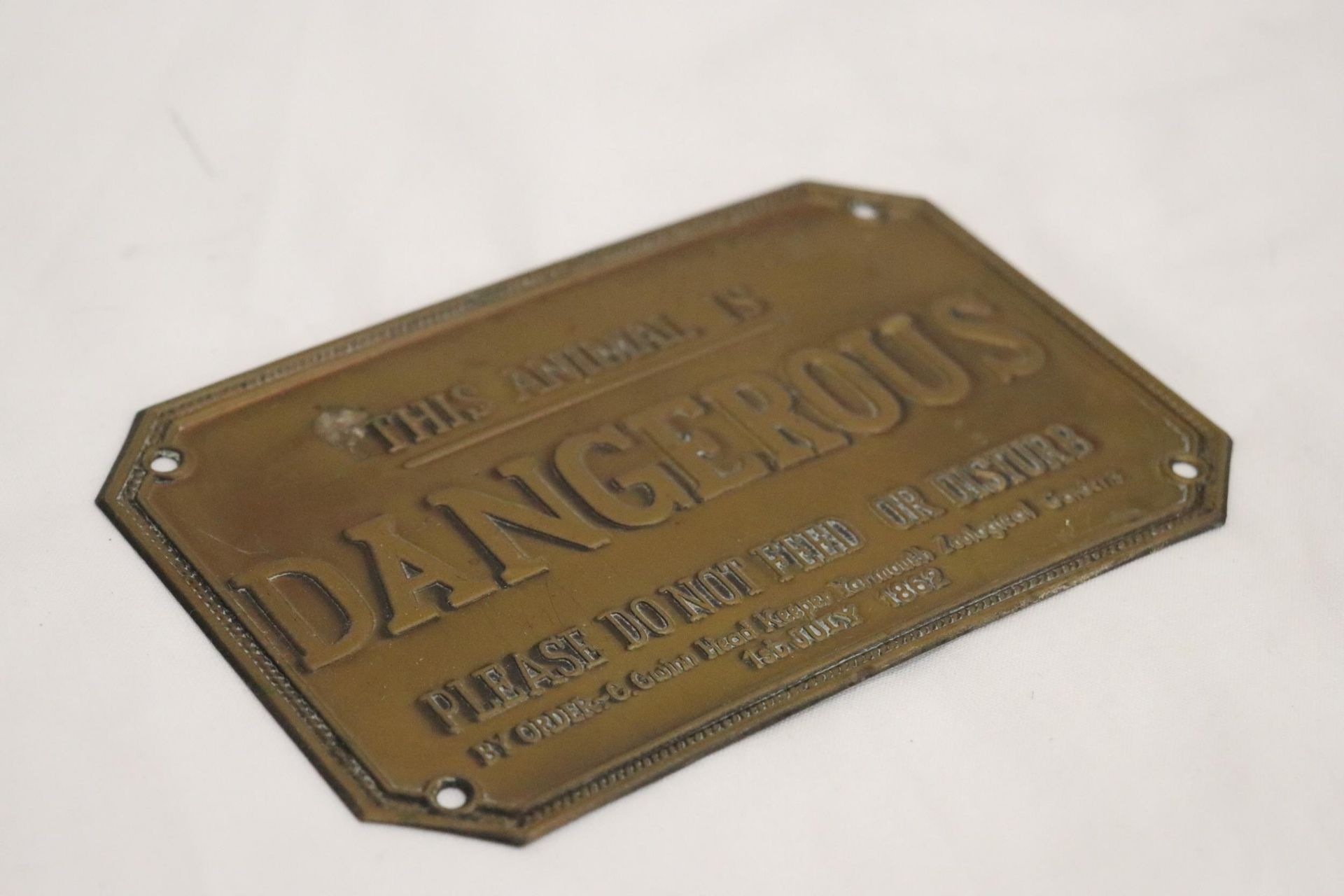 A VINTAGE BRASS PLATE "THIS ANIMAL IS DANGEROUS" DATED 1ST JULY 1862 - Image 2 of 4